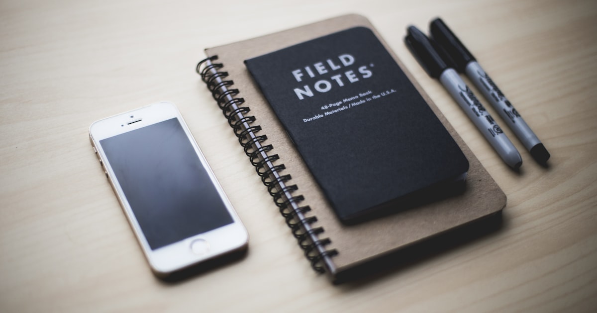 Sales rep taking coaching notes